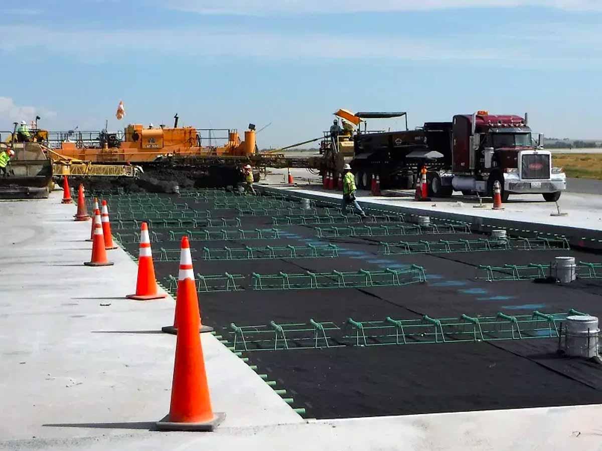 Reinforcement grid and prep work laid out ahead of paving at an airport facility, the groundwork airport runway paving projects require